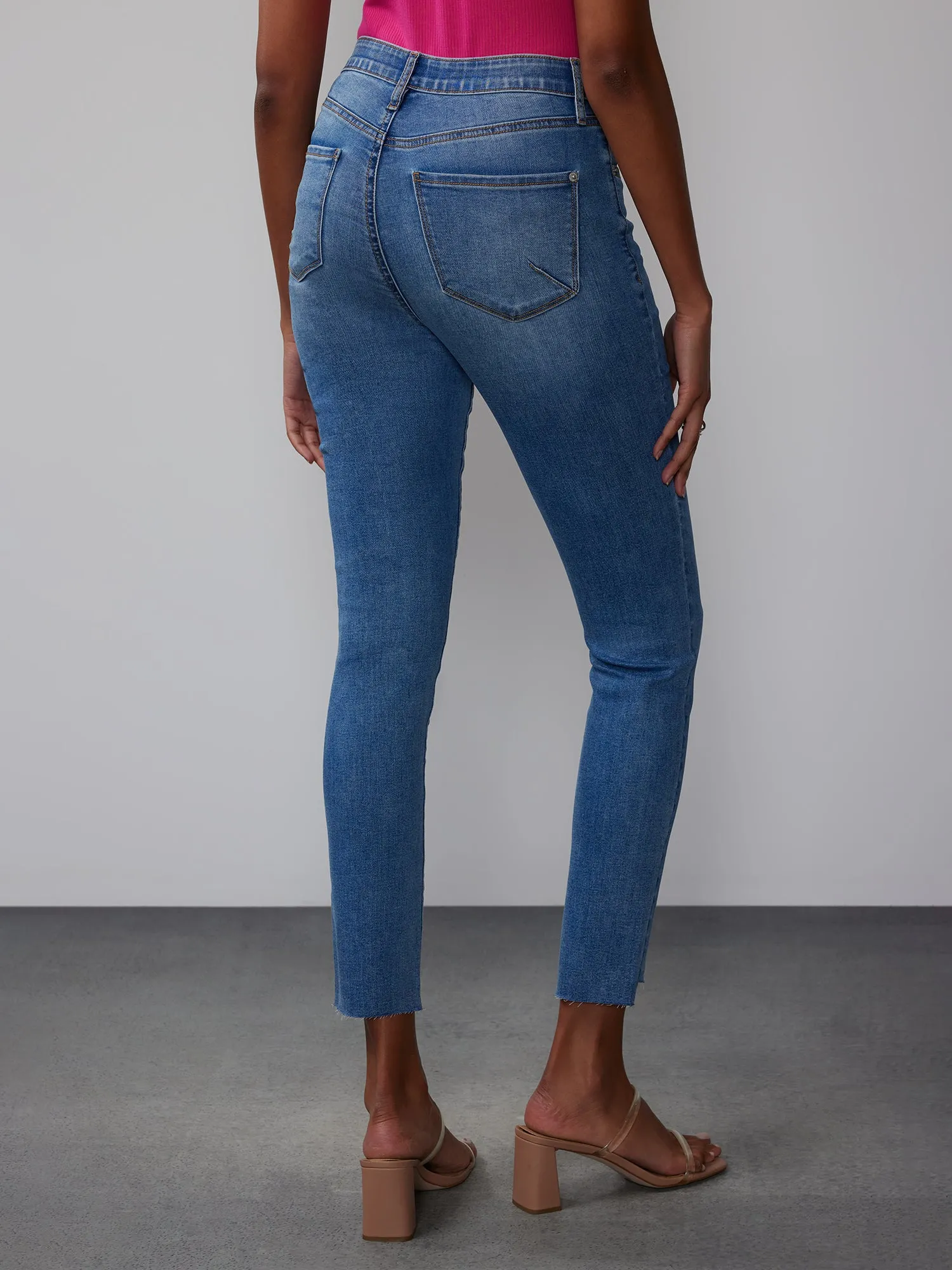 High Rise Curvy Step Hem Ankle Skinny Jeans